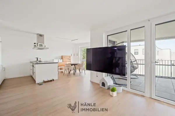 Wohnzimmer mit Blick auf Esszimmer + Küche